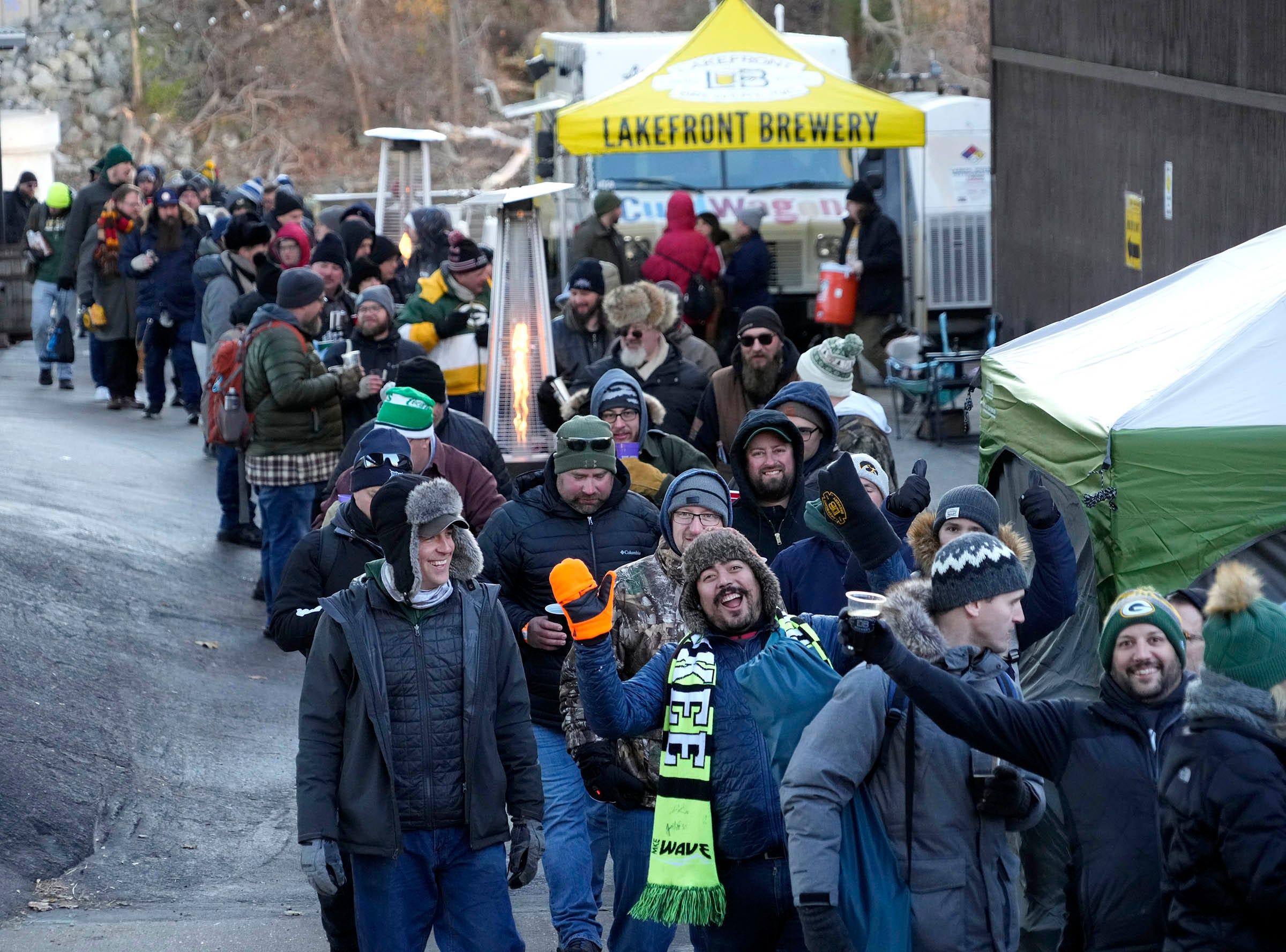 People bundled up from the cold in line on Black Friday