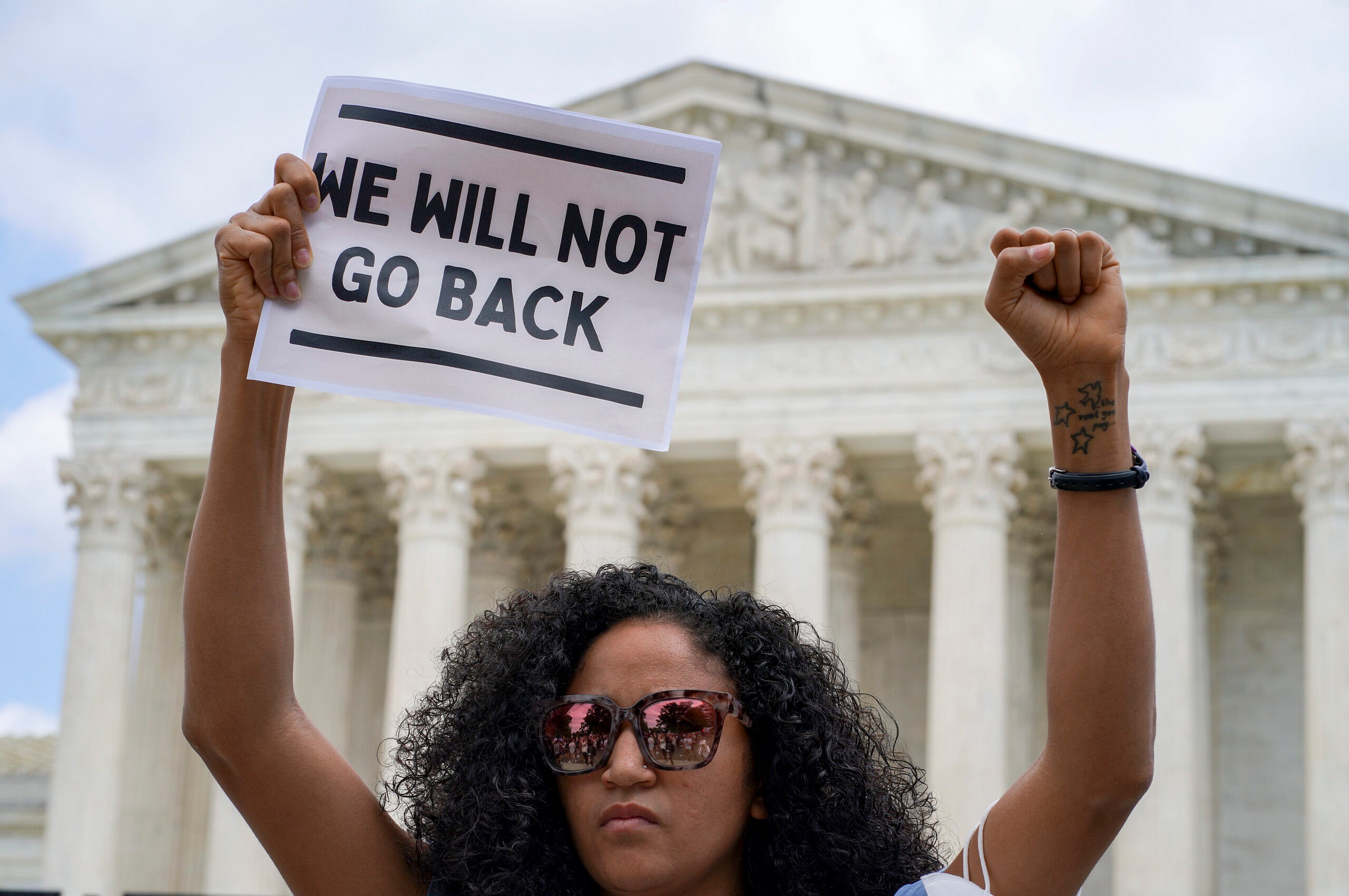 Scotney Young protests outside the U.S. Supreme Court