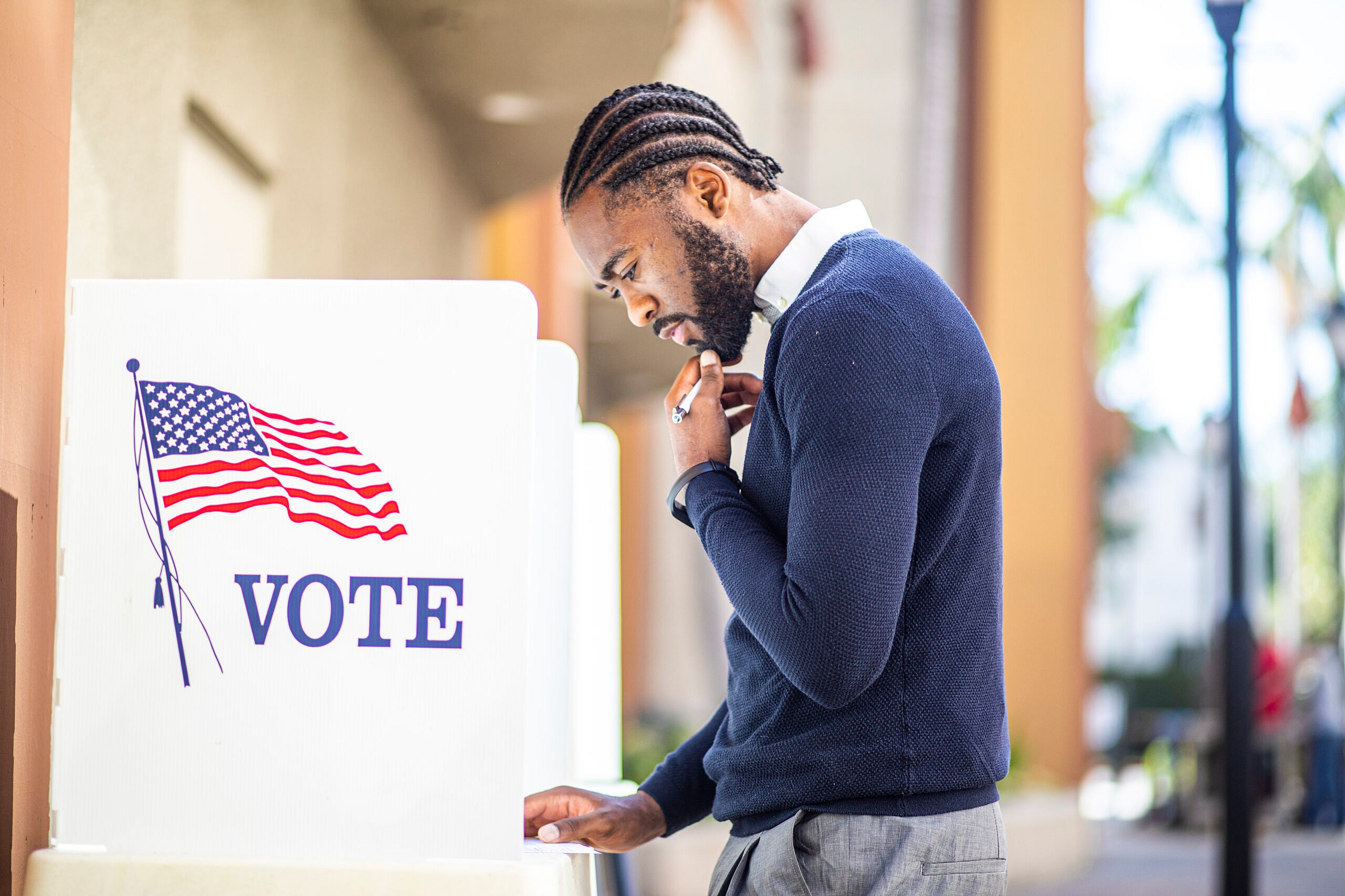 Black man voting, theGrio.com