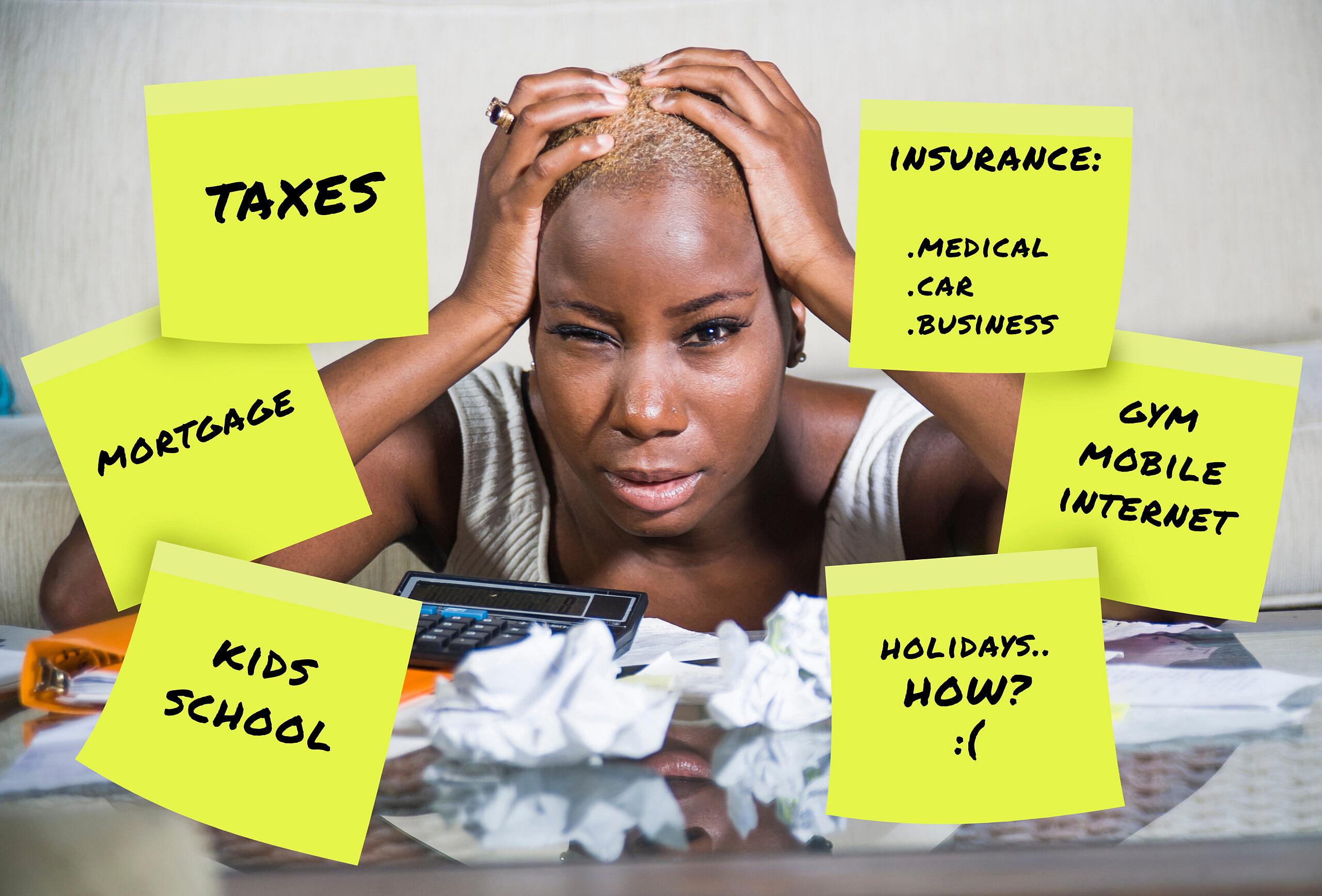Managing debt, making a budget, personal finance, household bills, holiday spending, theGrio.com