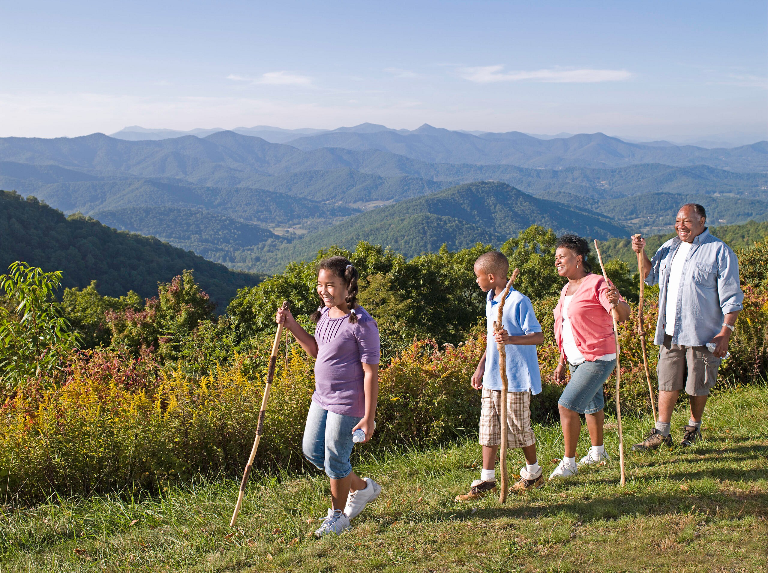 Family hiking with grand children (10-13) Blue Ridge Mountains in background