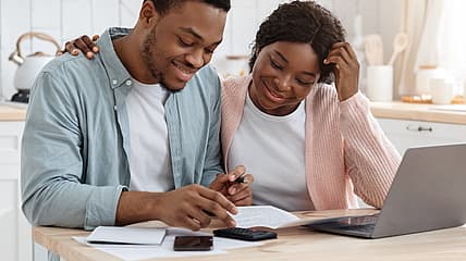 Taxes, tax season, paying taxes, tax refunds, IRS, Roth IRAs, emergency fund, high-interest credit card debt, personal finance, tax advice, financial advice, theGrio.com