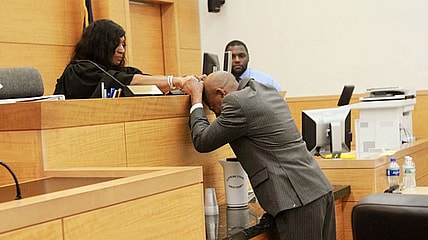 John Bunn cries after being exonerated by Supreme Court Justice Shawn'Dya Simpson for murder he didn't commit 17 years ago and was framed by police thegrio.com