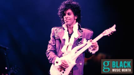 Prince performing on stage during the Purple Rain Tour
