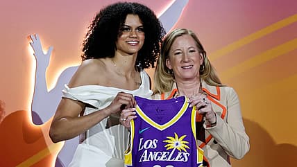 WNBA player Rae Burrell of the Los Angeles Sparks and WNBA Commissioner Cathy Engelbert