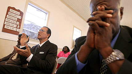 Black people praying theGrio.com