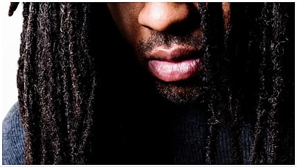 Viral video purportedly shows college baseball coach barring student from playing because of his locs