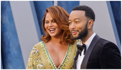 John and Chrissy at Vanity Fair Oscar Party