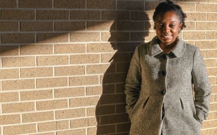 Joycelyn Davis, a direct descendant of Clotilda survivor Charlie Lewis,stands for a portrait at the community center in Africatown in Mobile, Ala., on Tuesday, Jan. 29, 2019. Davis is is organizing the "Spirit of Our Ancestors" festival, a reunion for descendants of Clotilda survivors. “I am so proud to say I am a descendant. That wasn’t a word that I used maybe 10, 15 years ago,” said Davis, 42, a sixth-generation granddaughter of African captive Charlie Lewis. “It was shameful as a child.” (AP Photo/Julie Bennett) thegrio.com