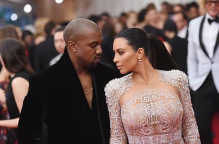 Kim Kardashian Kanye West thegrio.com