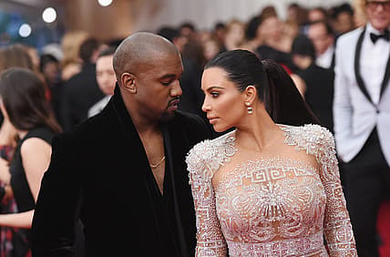 Kim Kardashian Kanye West thegrio.com