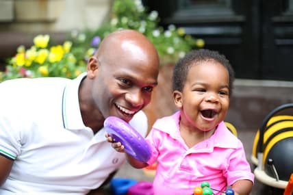Father with drooling baby