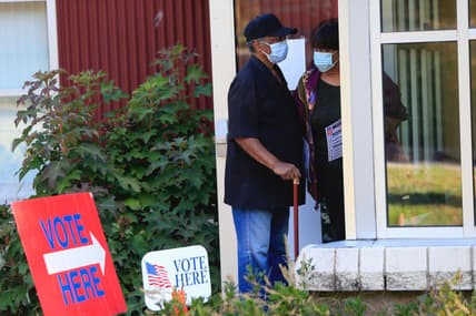 People Cast Ballots On First Day Of Early Voting In North Carolina