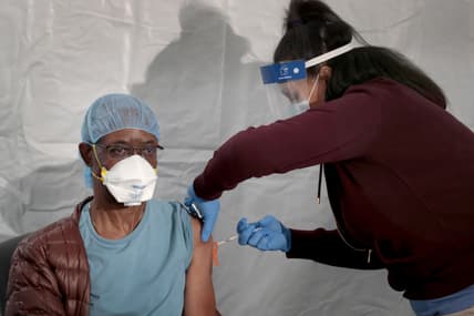 COVID vaccine thegrio.com