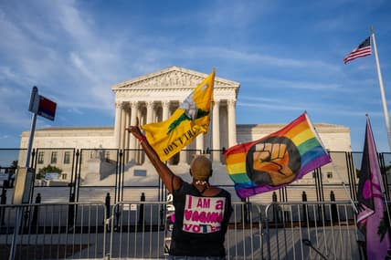 Nadine Sciler dances in front of the Supreme Court Building