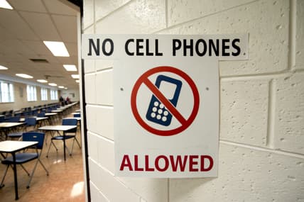 phones schools ban, phone school laws, What states have banned cell phones in schools?, phone school pouch, phone limitations in schools theGrio.com