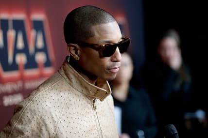 Pharrell Williams politcs, Pharrell Williams DEI, Pharrell Williams speech, Pharrell Williams Shoe of the Year award theGrio.com