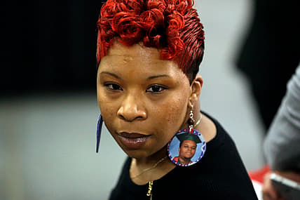 FILE - In this Dec. 11, 2015, file photo, Lesley McSpadden, the mother of Michael Brown, attends an event by Democratic presidential candidate Hillary Clinton in St. Louis. McSpadden could soon have oversight over the Ferguson, Missouri, police department connected to her son's death. On Tuesday, April 2, 2019, voters in Ferguson will select city council members in three of the St. Louis suburb's six wards. McSpadden is among three candidates running in Ward 3. (AP Photo/Jeff Roberson, File) thegrio.com