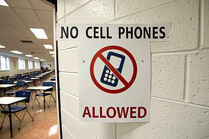 phones schools ban, phone school laws, What states have banned cell phones in schools?, phone school pouch, phone limitations in schools theGrio.com
