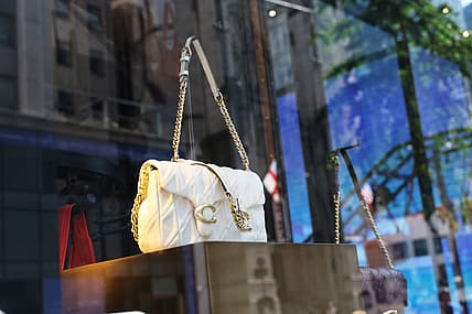 Coach And Michael Kors Parent Companies Go To Court In Anti-Trust Case