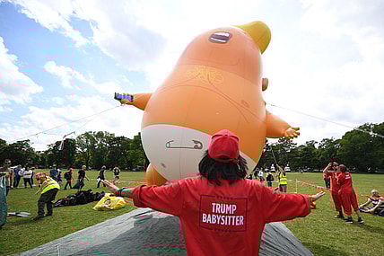 Baby Trump balloon thegrio.com