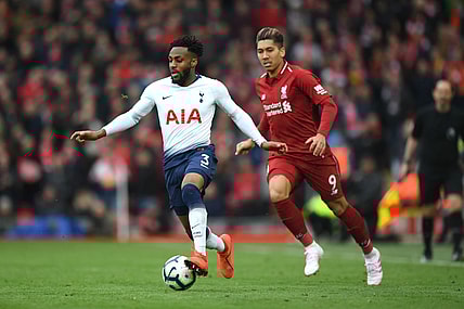 LIVERPOOL, ENGLAND - MARCH 31: Danny Rose of Tottenham Hotspur is close down by Roberto Firminho of Liverpool during the Premier League match between Liverpool FC and Tottenham Hotspur at Anfield on March 31, 2019 in Liverpool, United Kingdom. (Photo by Shaun Botterill/Getty Images) thegrio.com