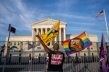 Nadine Sciler dances in front of the Supreme Court Building