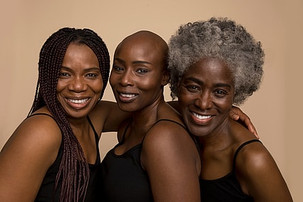 Three smiling women