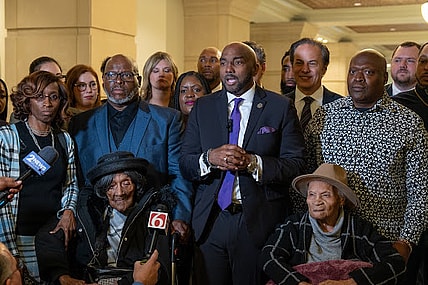 Attorney Damario Solomon-Simmons speaks at a press conference with survivors of the Tulsa Race Massacre