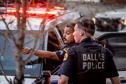 Jasmine Crockett, Dallas police shooting, Mike King Dallas standoff, Crockett security detail incident, Dallas SWAT shooting hospital garage, off-duty police security, Texas, thegrio.com