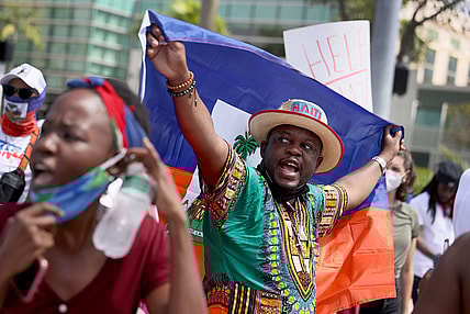 Activists In Miami Call On Biden Administration To End Abuses Against Haitian Migrants