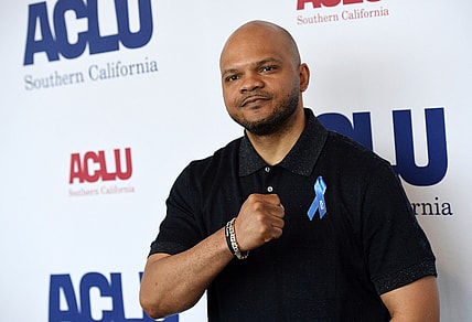 FILE- In this June 7, 2019 file photo, honoree Kevin Richardson poses at the ACLU SoCal's 25th Annual Luncheon at the JW Marriott at LA Live, in Los Angeles. Richardson, a member of the Central Park Five, who once dreamed of attending Syracuse University is making his long-awaited first visit to the campus on Sunday, Sept. 8, 2019, when he accepts the university’s invitation to visit and lend his name to a scholarship. (Photo by Chris Pizzello/Invision/AP, File)