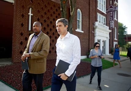 Presidential candidate Beto O'Rourke(right) and Rev. Robert L. Turner Sr. pass the the Vernon AME Church while on a tour of the Greenwood District Monday, Aug. 19, 2019. MIKE SIMONS/Tulsa World
