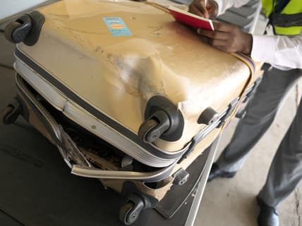 damaged luggage theGrio.com