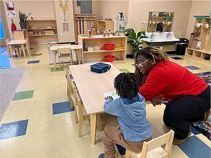 Dr Deja Jones working with one of her students in the main Montessori classroom Photo Desiree Hadley, thegrio.com