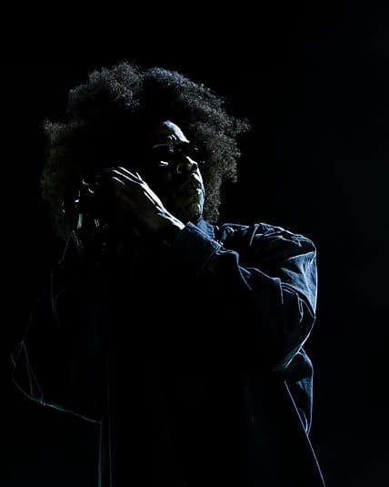 Jay-Z performs at the 2026 Root Picnic in Philadelphia, debuting his afro hairstyle