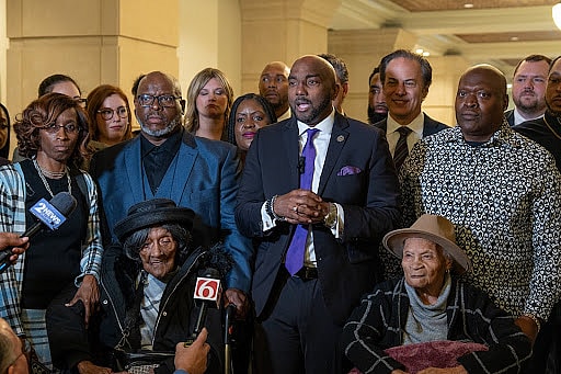 Attorney Damario Solomon-Simmons speaks at a press conference with survivors of the Tulsa Race Massacre