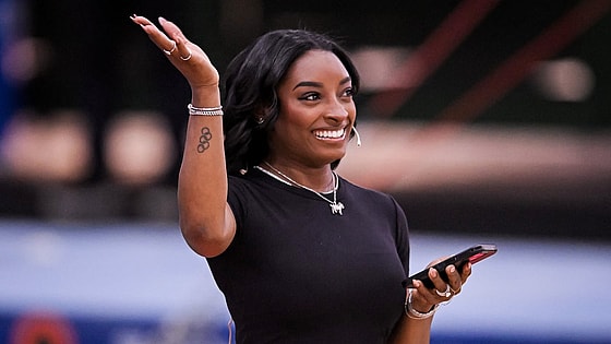 BUENOS AIRES, ARGENTINA - OCTOBER 9: Simone Biles greets the fans during a Gymnastics Clinic at Youth Olympic Park Villa Soldati on October 9, 2025 in Buenos Aires, Argentina. (Photo by Marcelo Endelli/Getty Images) theGrio.com