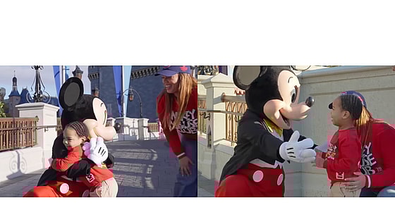 Mickey Mouse and a fan at Magic Kingdom