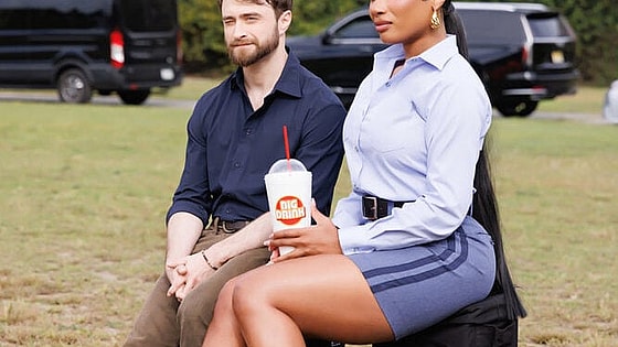 THE FALL AND RISE OF REGGIE DINKINS -- "You May Hug Your Hero" Episode 105 -- Pictured: (l-r) Daniel Radcliffe as Arthur Tobin, Megan Thee Stallion as Denise -- (Photo by: Hot Girl Productions)