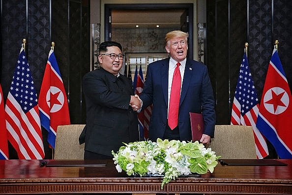 Donald Trump Kim Jong-un thegrio.com