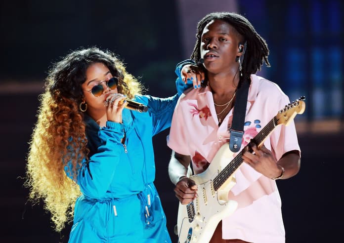 H.E.R. Daniel Caesar thegrio.com