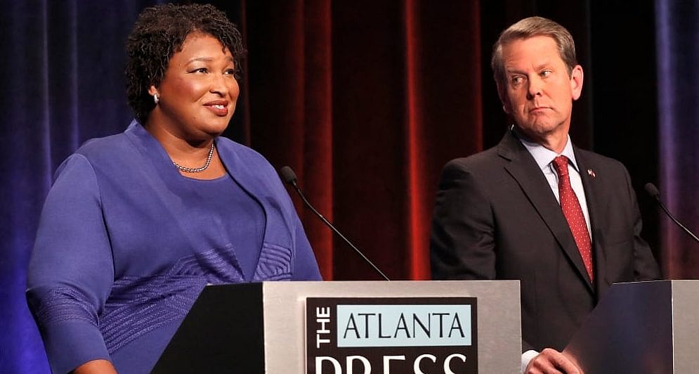 Stacey Abrams and Brian Kemp Georgia thegrio.com