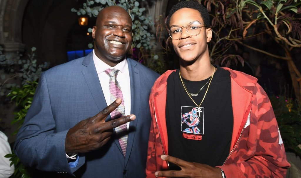 WEST HOLLYWOOD, CA - AUGUST 07: Former NBA player Shaquille O'Neal (L) and son Shareef O'Neal at Apple Music Launch Party Carpool Karaoke: The Series with James Corden on August 7, 2017 in West Hollywood, California. (Photo by Emma McIntyre/Getty Images for Apple) thegrio.com