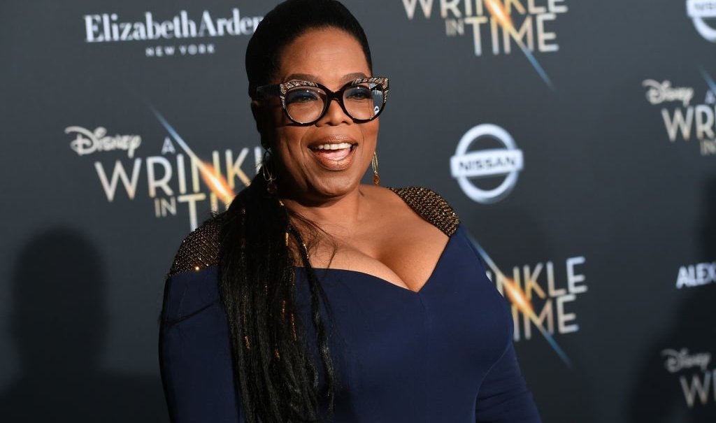 LOS ANGELES, CA - FEBRUARY 26: Oprah Winfrey attends the premiere of Disney's "A Wrinkle In Time" at the El Capitan Theatre on February 26, 2018 in Los Angeles, California. (Photo by Kevin Winter/Getty Images) thegrio.com