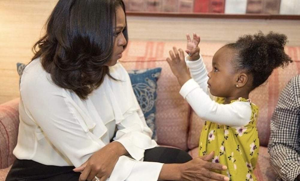 Michelle Obama dances with Parker Curry. thegrio.com