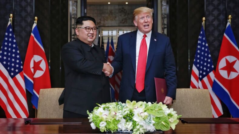 Trump Kim Jong-un thegrio.com