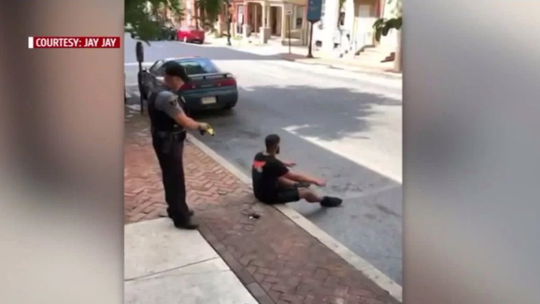 Police use stun gun on man seated on curb in Lancaster, PA thegrio.com