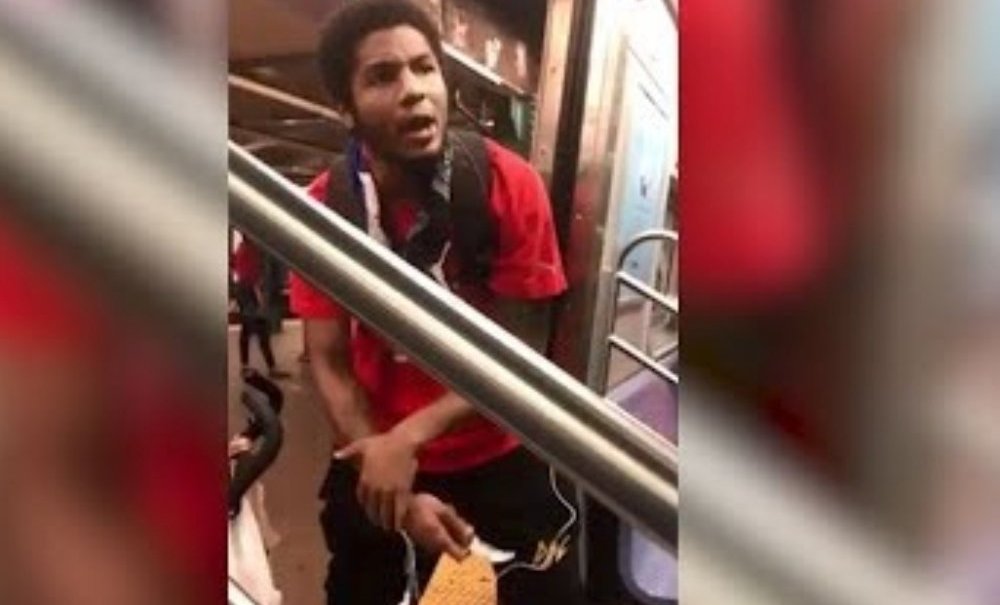 man slaps toddler on subway train