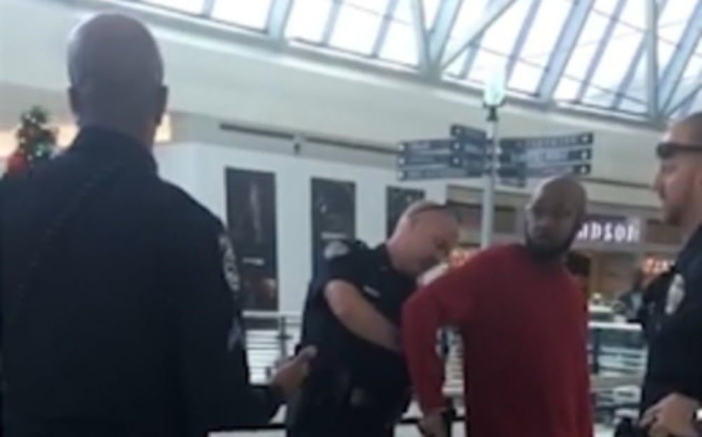 Ro Lockett was handcuffed by Frisco police after being accused of stealing from a Frontline store. (Ro Lockett/Facebook) thegrio.com